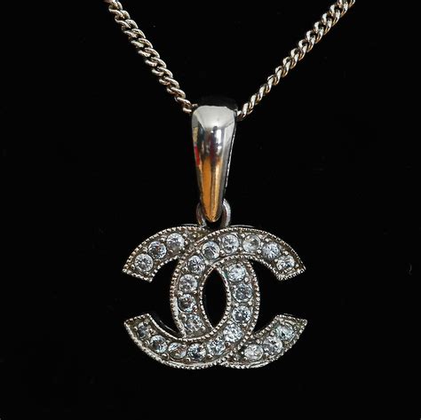 collier chanel logo|chanel ring necklace.